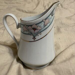 Elegant Floral Ceramic Pitcher